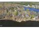 Lakeside properties highlighting direct access to water and lush surroundings at 155 Chimney Rise Dr, Cary, NC 27511