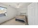 Bedroom with a metal bed frame, carpet, and a window with natural light at 155 Chimney Rise Dr, Cary, NC 27511