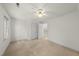 Bedroom with a ceiling fan, carpet, and an open doorway to the hallway at 155 Chimney Rise Dr, Cary, NC 27511