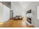 A bright living room features hardwood floors, fireplace, and natural light at 155 Chimney Rise Dr, Cary, NC 27511