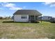 The home features a spacious backyard with a screened porch perfect for relaxation and outdoor enjoyment at 16 Blue Monarch Ln, Fuquay Varina, NC 27526