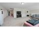 Open bonus room with carpeting, media center, and an adjoining room, providing flexible living space at 16 Blue Monarch Ln, Fuquay Varina, NC 27526