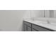 Bathroom with double vanity, quartz countertops, and modern fixtures at 163 Fair Child Rd, Spring Lake, NC 28390