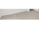 This bedroom has neutral walls, light carpeting, and white doors at 163 Fair Child Rd, Spring Lake, NC 28390