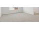 Bedroom featuring neutral carpet, white walls, and a window at 163 Fair Child Rd, Spring Lake, NC 28390