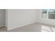 This bedroom features natural light, light carpeting, and neutral walls at 163 Fair Child Rd, Spring Lake, NC 28390