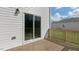 Sliding glass doors leads to the wooden deck, extending the living space outdoors at 163 Fair Child Rd, Spring Lake, NC 28390