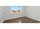 Bright office space featuring hardwood flooring and a large window at 163 Fair Child Rd, Spring Lake, NC 28390