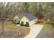 Aerial view of the home showcasing its well-maintained lawn at 1638 Crystal Ln, Stem, NC 27581