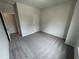 Bedroom with neutral carpet, and door to another room at 168 Bruce Dr, Dunn, NC 28334