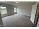 Comfortable bedroom with plush carpeting and plenty of natural light at 168 Bruce Dr, Dunn, NC 28334