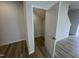 Small closet with white wire shelving and an arched white door at 168 Bruce Dr, Dunn, NC 28334