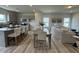 Open-concept living space with modern kitchen, dining area, and a comfortable living room at 168 Bruce Dr, Dunn, NC 28334