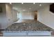 Open floor plan showcasing granite counters connecting the kitchen to the living room at 168 Bruce Dr, Dunn, NC 28334