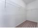 Walk-in closet with carpeted floor and wire shelving for ample storage space at 168 Bruce Dr, Dunn, NC 28334