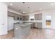 Modern kitchen with stainless steel appliances, granite countertops, and island at 168 Bruce Dr, Dunn, NC 28334