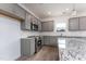 Modern kitchen with stainless steel appliances and granite countertops at 168 Bruce Dr, Dunn, NC 28334