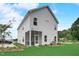Beautiful two-story home boasting a screened-in porch and well-manicured lawn at 176 Bruce Dr, Dunn, NC 28334