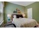 Comfortable bedroom with truck-themed decor, side tables, and lamps at 176 Bruce Dr, Dunn, NC 28334