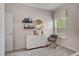 Bright Bedroom with storage chest, decorative mirror, and comfy rocking chair at 176 Bruce Dr, Dunn, NC 28334