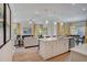 Open-concept kitchen with a large island, pendant lights, and seamless flow to the living and dining areas at 176 Bruce Dr, Dunn, NC 28334