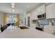 Bright, modern kitchen featuring a large island with seating, stainless steel appliances, and stylish finishes at 176 Bruce Dr, Dunn, NC 28334