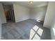 Spacious carpeted bedroom with ensuite, lots of light, and neutral paint at 176 Bruce Dr, Dunn, NC 28334