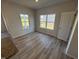 Dining area featuring wood-look floors, a window, and views to the outside at 176 Bruce Dr, Dunn, NC 28334