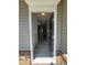 Inviting entryway featuring wood-look floors and a view of the staircase at 176 Bruce Dr, Dunn, NC 28334