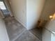 Carpeted stairs lead from the second floor to the first floor of the home at 176 Bruce Dr, Dunn, NC 28334