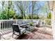 Relax on the spacious back deck with comfortable seating, perfect for entertaining or enjoying the outdoors at 211 W Chisholm St, Sanford, NC 27330