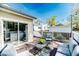 Enjoy outdoor living on this back deck featuring string lights and comfortable seating area at 211 W Chisholm St, Sanford, NC 27330