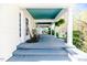Inviting front porch with classic rocking chairs, offering a relaxing outdoor space at 211 W Chisholm St, Sanford, NC 27330