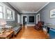 Inviting living room featuring hardwood floors and charming decor at 211 W Chisholm St, Sanford, NC 27330