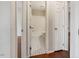 Bathroom featuring black and white tile flooring, a tub and shower and a toilet at 227 Coley Farm Rd, Fuquay Varina, NC 27526