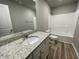 Full bathroom with a modern vanity and shower/tub combo at 279 Constellation Ct, Benson, NC 27504