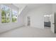 Bright bedroom with an ensuite bathroom, large windows and walk-in closet at 2809 Theresa Eileen Way, Raleigh, NC 27603