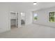Bedroom with large windows, walk-in closet and an ensuite bathroom at 2809 Theresa Eileen Way, Raleigh, NC 27603