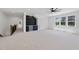 Overhead view of bonus room with wet bar, beverage cooler, and large windows at 2809 Theresa Eileen Way, Raleigh, NC 27603