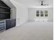 Open bonus room with a ceiling fan and a built in bar area, perfect for entertaining at 2809 Theresa Eileen Way, Raleigh, NC 27603