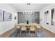 Bright dining room features stylish decor, modern lighting, and a view of the outdoors at 2809 Theresa Eileen Way, Raleigh, NC 27603