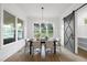 Modern dining room featuring an expansive outdoor view at 2809 Theresa Eileen Way, Raleigh, NC 27603