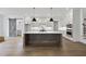 Spacious kitchen features an island, modern appliances, and ample cabinet space at 2809 Theresa Eileen Way, Raleigh, NC 27603