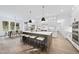 Bright kitchen with a large island, barstool seating, and modern appliances at 2809 Theresa Eileen Way, Raleigh, NC 27603