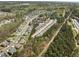 Birds eye view of a well-planned residential area with multiple townhome communities and ample greenery at 30 Holly Berry Ln, Durham, NC 27703