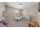 bedroom with a twin bed, carpeted floors, neutral walls and a window at 30 Holly Berry Ln, Durham, NC 27703