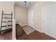 Bright entryway features beautiful flooring, storage bench, and ample closet space at 30 Holly Berry Ln, Durham, NC 27703