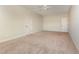 Large bedroom features neutral carpet, a ceiling fan and a walk-in closet at 3034 E Bay Court, Creedmoor, NC 27522