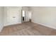 Bedroom showcasing neutral carpet and walls and access to a bathroom and the upstairs at 3034 E Bay Court, Creedmoor, NC 27522