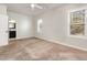 Light filled bedroom featuring a view to the bathroom at 3034 E Bay Court, Creedmoor, NC 27522